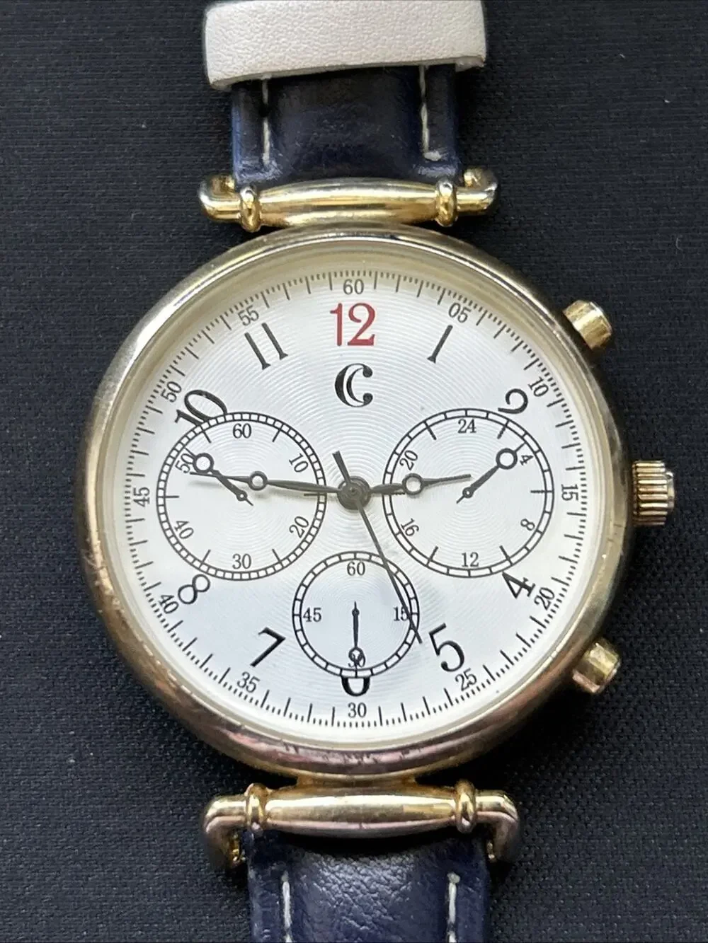 Charming Charlie Gold Tone Navy Blue Band Women’s Quartz Watch